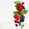 Berries with spoon on Wooden Background. Health, Diet, Gardenin