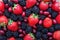 Berries, summer fruit on wooden table