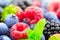 Berries. Various colorful berries background. Strawberry, raspberry, blackberry, blueberry closeup