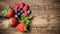 Berries on Wooden Background. Organic Berry over Wood