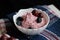 berry cottage cheese cream in white sauce bowls, the dish is decorated with fresh berries