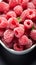 Berry frost View from above, frozen organic raspberries in bowl