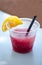 Berry frozen drink with a lemon