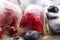 Berry fruits frozen in ice cubes