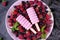 Berry ice cream pops with raspberry and bilberry