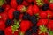 Berry mix with strawberry and raspberry, food background