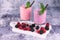 Berry smoothie. Raspberry and blackberry smoothies in glasses.