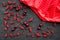 Berry theme. Red currant and cherry on black table background top view mockup