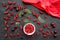 Berry theme. Red currant, cherry and leaves on black table background top view mockup