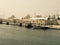 Berth for fishing boats. A fishing pier in the seaport near the fish market building.