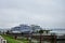 Berth on the river cruise ships embankment, bridge automobile, fog over