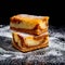 Besquit, cake on a black background, sprinkled with powdered sugar, dark and light layer of beckett on a black background, copy