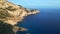 Best aerial top view flight drone Sunset cliff hiking Ibiza island tower Spain