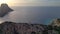 Best aerial top view flight drone Sunset cliff Ibiza pirates island tower Spain