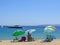 Best beaches of Pelion peninsula. Bright colored umbrellas. Pagasetic gulf. Greece.