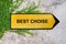 Best choise on yellow sign hanging on ivy wall