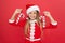 Best Christmas decor. Happy kid hold candy canes. Little girl with xmas decorations. Candy cane Christmas ornament. Red