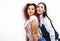 Best friends diverse races teenage girls together having fun, asian and african , posing emotional on white background