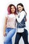 Best friends diverse races teenage girls together having fun, asian and african , posing emotional on white background
