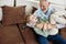 Best friends. Portrait of cheerful grandfather and excited grandson embracing, playing and having fun while relaxing on