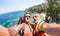 Best friends taking selfie at Giglio Island on adventure travel - Wanderlust lifestyle concept with gay couple enjoying happy fun