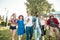 Best multiracial friends hanging out together and walking in park in summer day.