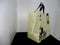 Best Polypropylene Fabric yellow Bag, Shopping printed bag on black table