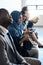 Only the best will pass the test. Shot of a group of well-dressed businesspeople seated in line while waiting to be