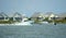 Bethany Beach, Delaware, U.S.A - September 2, 2019 - Fishing boats on the Indian River Inlet in the hot summer day