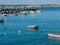 Beuatiful harbor of Sagres with a fisher boat at the Algarve coast of Portugal