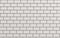 Beveled white matt ceramic tiles pattern herringbone on wall. 3d Render