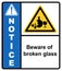 Beware of broken glass. Glass shards dump area. Sign notice