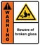 Beware of broken glass. Glass shards dump area. Sign warning