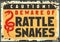 Beware of rattlesnakes caution sign