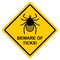 Beware of ticks! Yellow warning sign. Vector illustration. Warning of the infection risk from a tick bite. Black mite isolated on