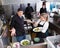 Bewildered chef talking with waitress