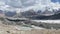 A bewitching view of the snow-capped mountains, colored rocks, hills and lakes of Kyrgyzstan. Beautiful mountain landscape