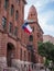 Bexar County Courthouse in San Antonio, Texas, with waving Texan Flag outside