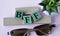 BFF - acronym on wooden cubes on the background of glasses and cactus