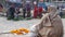 BHAKTAPUR, KATHMANDU, NEPAL - 18 October 2018 Asian people selling goods in national clothes, morning fruit vegetables