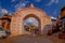 BHAKTAPUR, NEPAL - NOVEMBER 04, 2017: Huge gate at the enter of secondary high school, with stoned animals at the enter