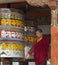 Bhutan - Buddhist Monk turning Prayer Wheels