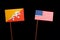 Bhutan flag with USA flag isolated on black