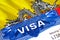 Bhutan Visa in passport. USA immigration Visa for Bhutan citizens focusing on word VISA. Travel Bhutan visa in national