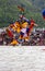 Bhutanese Cham masked dance, bird mask dancer leap into the air , Bhutan