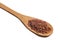 Bhutanese Red Rice. Grains over wooden spoon, isolated white background.