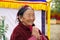 Bhutanese woman at the Memorial Chorten, Thimphu, Bhutan.