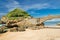 Biarritz, France - May 20, 2017: people walking on stone footbridge in scenic seascape on atlantic coastline in blue sky