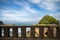 Biarritz, France - October 4, 2017: view through stone fence - tourists sightseeing wonderful touristic Biarritz