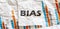 BIAS word text on the white memo note crupled sticker on chart background